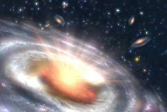 Artist concept of a growing black hole, or quasar, seen at the center of a faraway galaxy. 